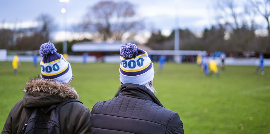 Photo of two people watching thornaby fc